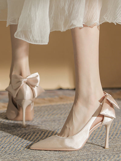 back ribbon pointed toe pumps