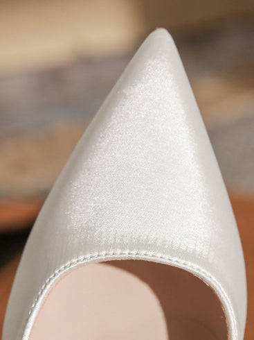 back ribbon pointed toe pumps