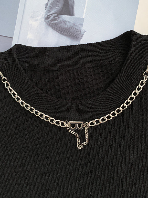 black sleeveless with chain necklace