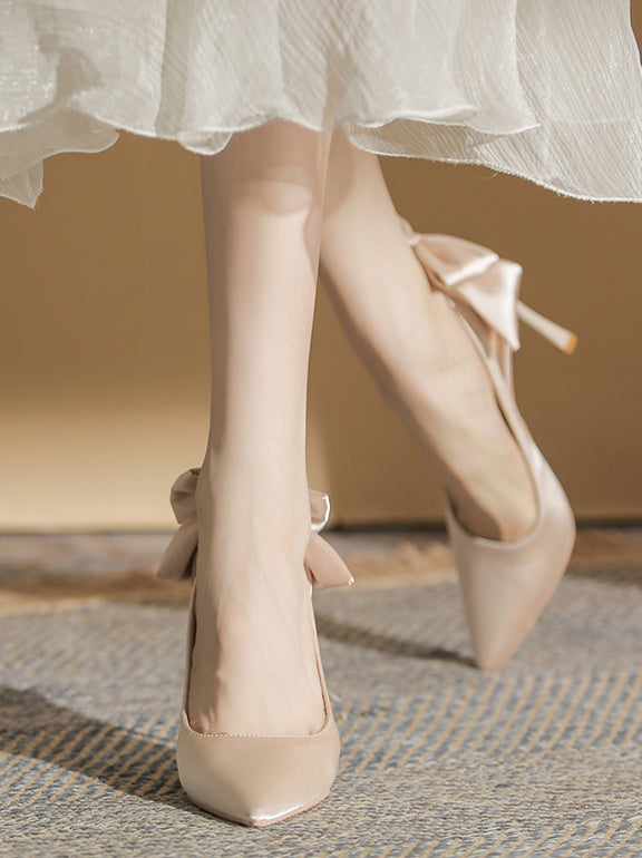 back ribbon pointed toe pumps