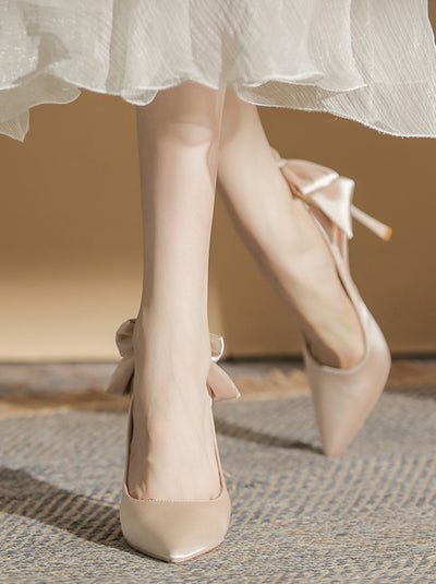 back ribbon pointed toe pumps