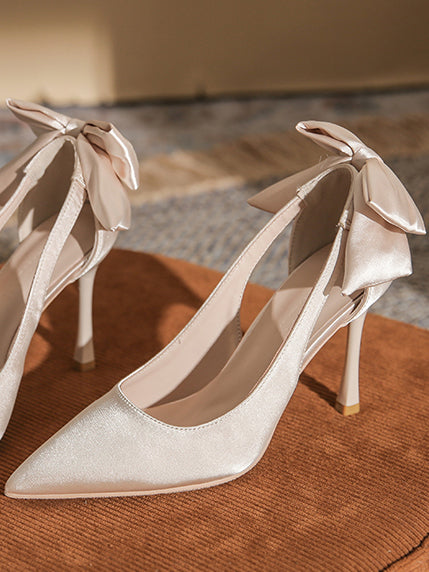back ribbon pointed toe pumps
